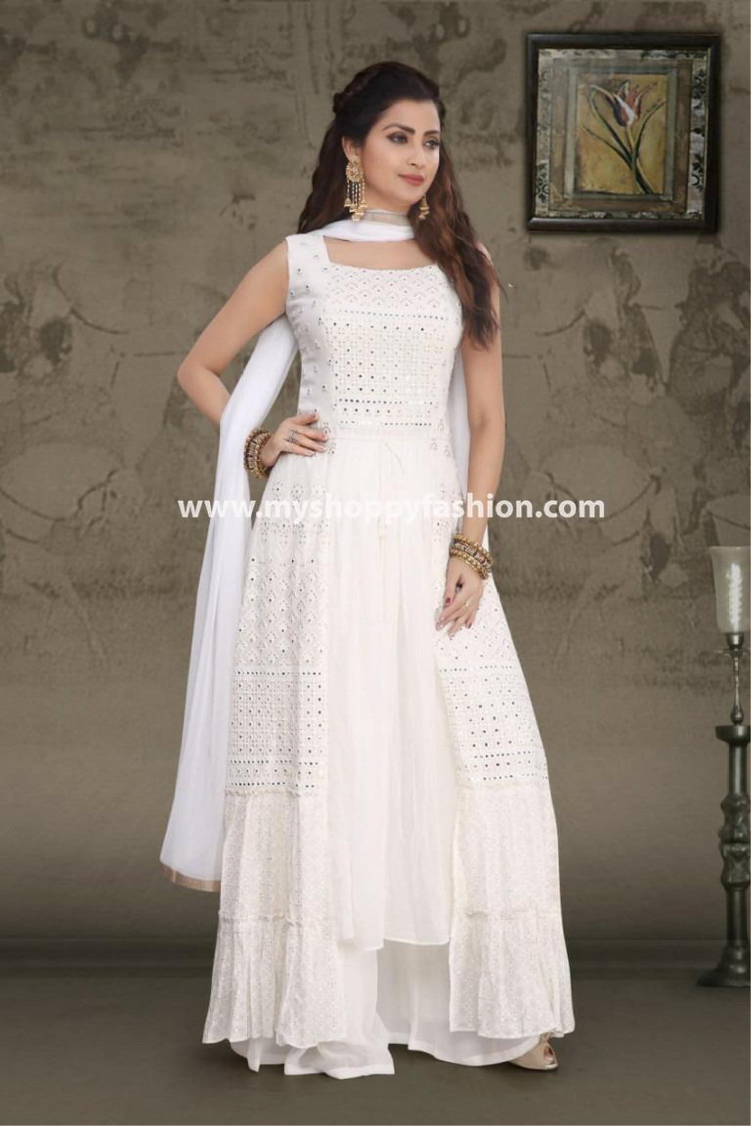White plazo suit with yellow printed flowers | Designer dresses indian,  Designer dresses, Fancy suit