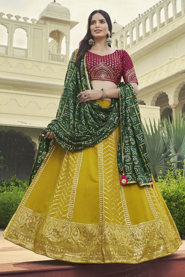 Rani Yellow Color Wedding Wear Designer Semi-Stitched Lehenga Choli